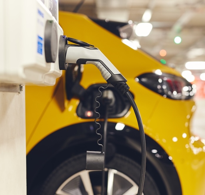 Electric,Car,Charging,In,Underground,Car,Park,In,Shopping,Center